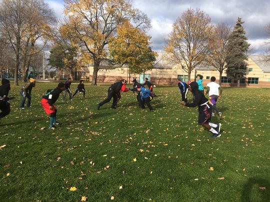 Police, Teens Come Together For Feast And Football