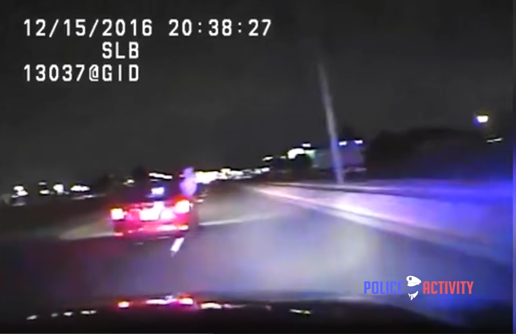 Watch Suspects Shoot At Police Hanging Outside Car, Suspect Ran Over By Cops