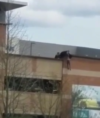 Watch Police Officers’ Dramatic Rescue From Top Of Building