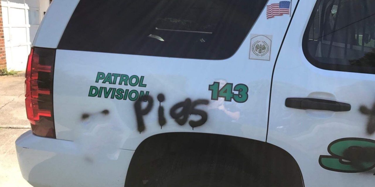 Police Cars Vandalized With Paint