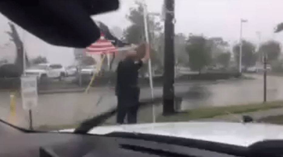 Police Lieutenant Saves American Flag In Hurricane Irma