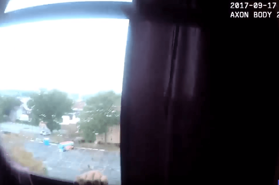 Watch Dramatic Police Rescue Of Man Hanging Out Window