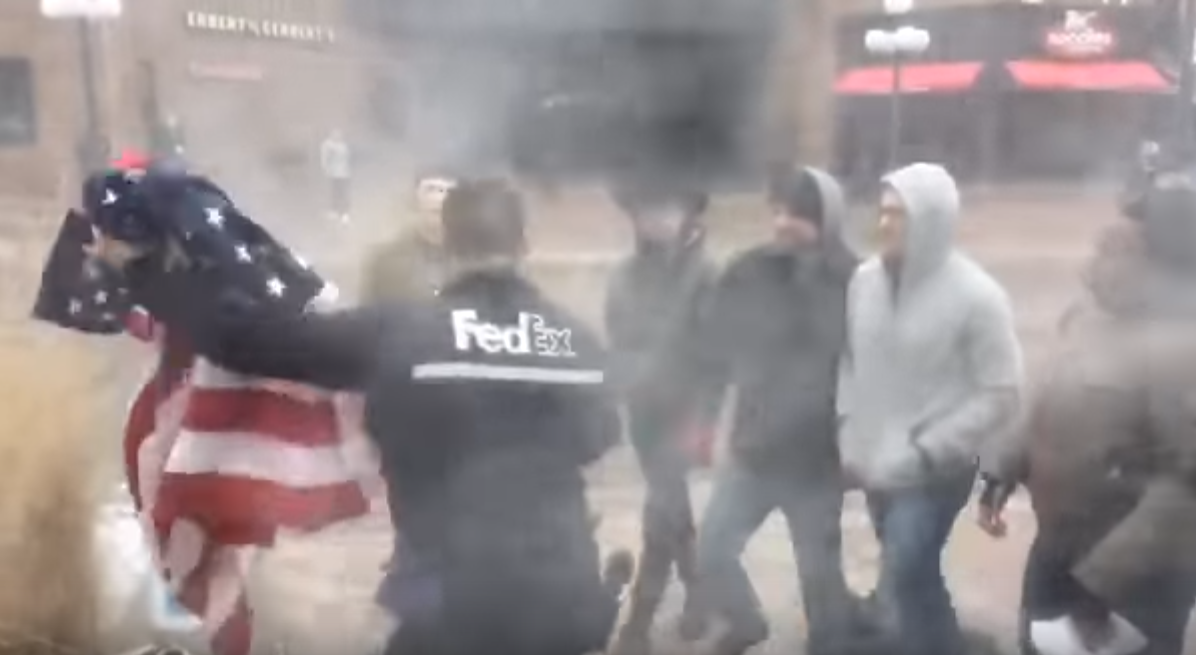 Watch FedEx Driver Save American Flag From Getting Burned