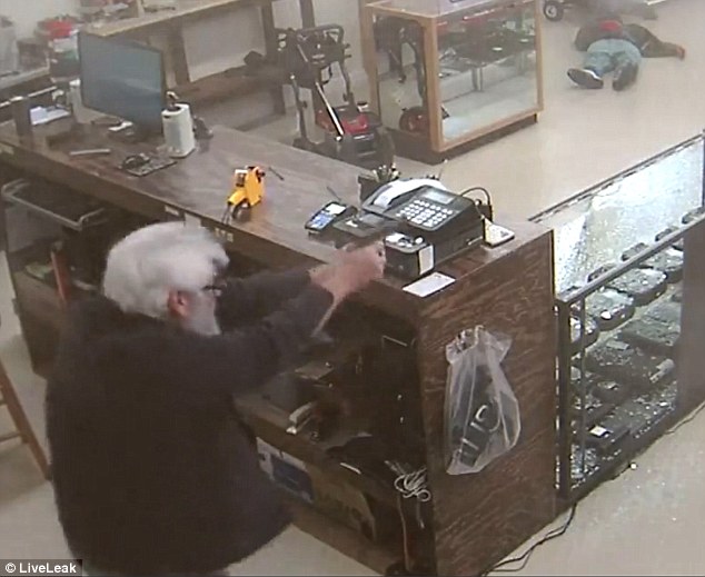 Gun Store Owner Shoots Robber Dead - Law Officer