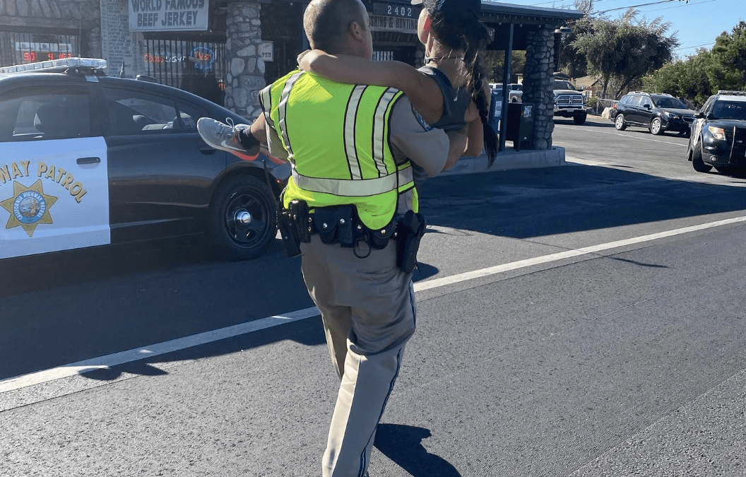 California Highway Patrol officer gets injured marathon runner to finish line