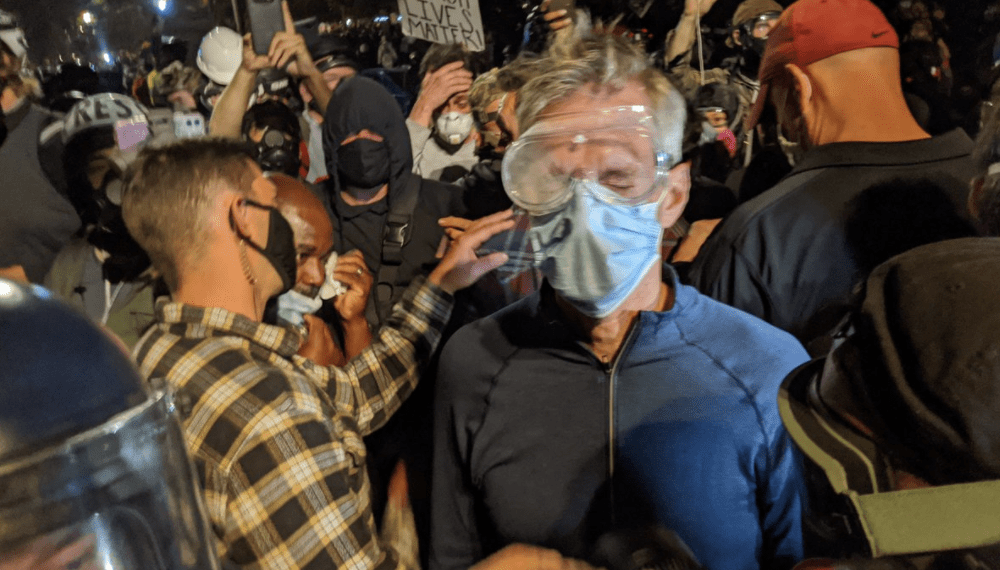 Portland Mayor Gets Scorned By Protesters Tear Gassed By Federal Agents Law Officer 