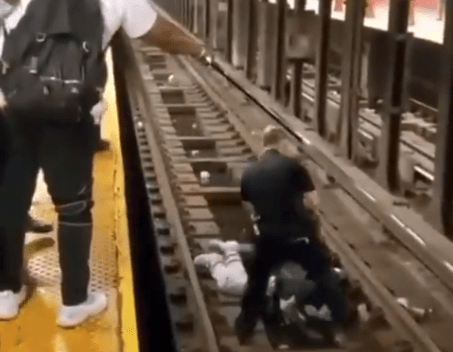 NYPD Officer Saves Man Who Fell On Subway Tracks Moments Before Train ...